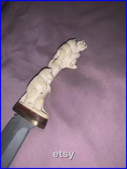 Jolie couteau fait à la main sculpter dans une corne d origlal véritable