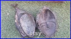 Lot de 2 masques de type YOHOURE en bronze Lot de 2 masques de type YOHOURE en bronze