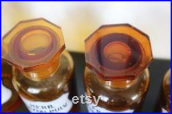 Serie de 7 pots ou flacons en verre marron de pharmacie ou apothicaire