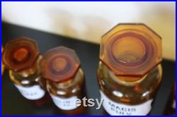 Serie de 7 pots ou flacons en verre marron de pharmacie ou apothicaire